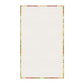 A kitchen tea towel with a floral pattern inspired by William Morris, featuring honeysuckle designs in red, yellow, and green on a light background.