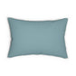 A rectangular lumbar cushion with a William Morris & Co floral pattern in shades of blue, beige, and white, featuring a concealed beige zipper.