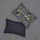 Rectangular lumbar cushion with a floral William Morris & Co pattern in yellow, green, and other colours on a dark background.