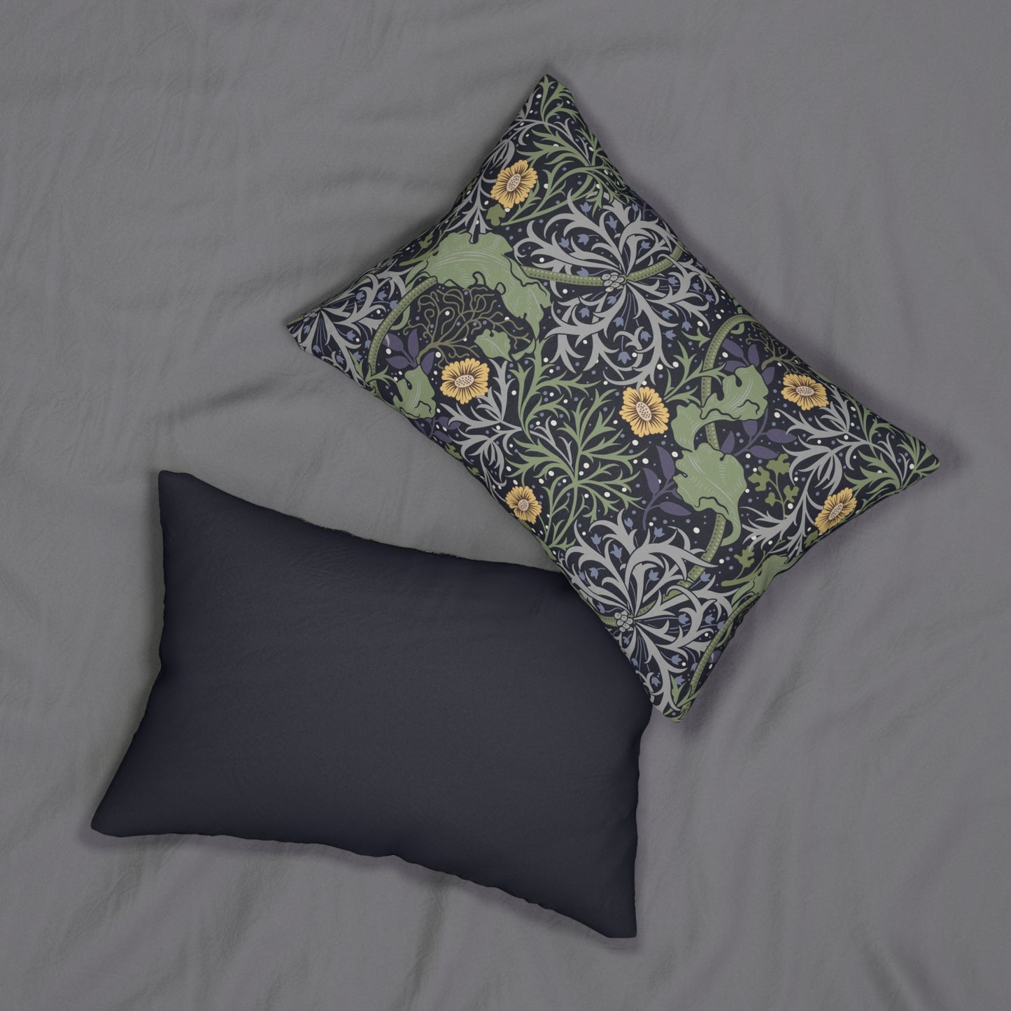 Rectangular lumbar cushion with a floral William Morris & Co pattern in yellow, green, and other colours on a dark background.