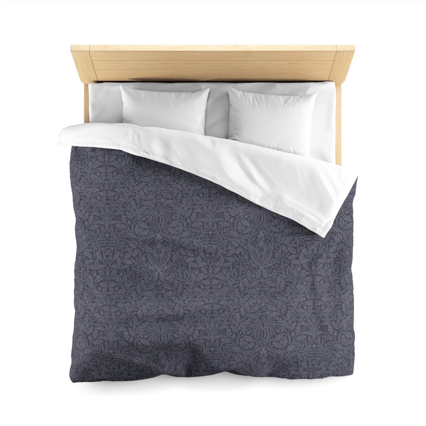Gray patterned duvet cover with white pillows on a wooden bed frame against a white background