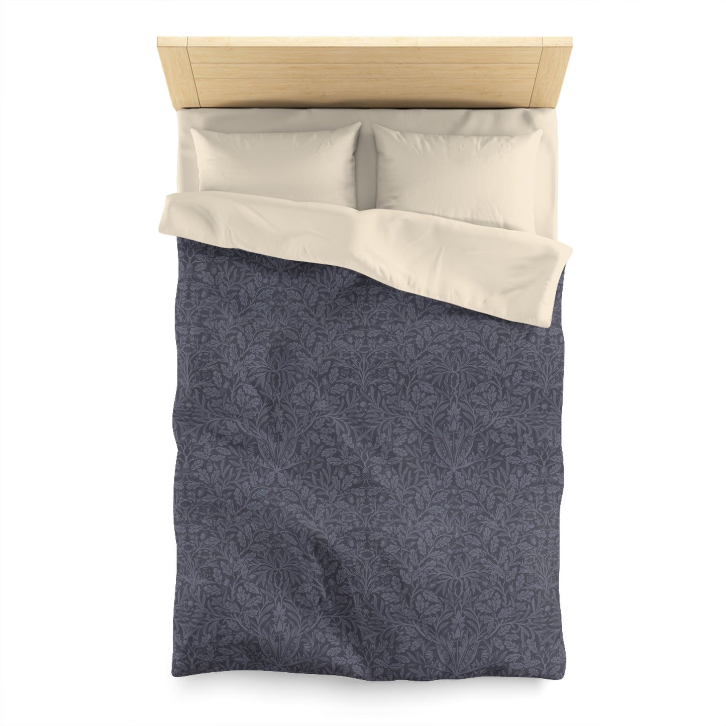 Gray patterned duvet cover with beige pillow shams on a white background