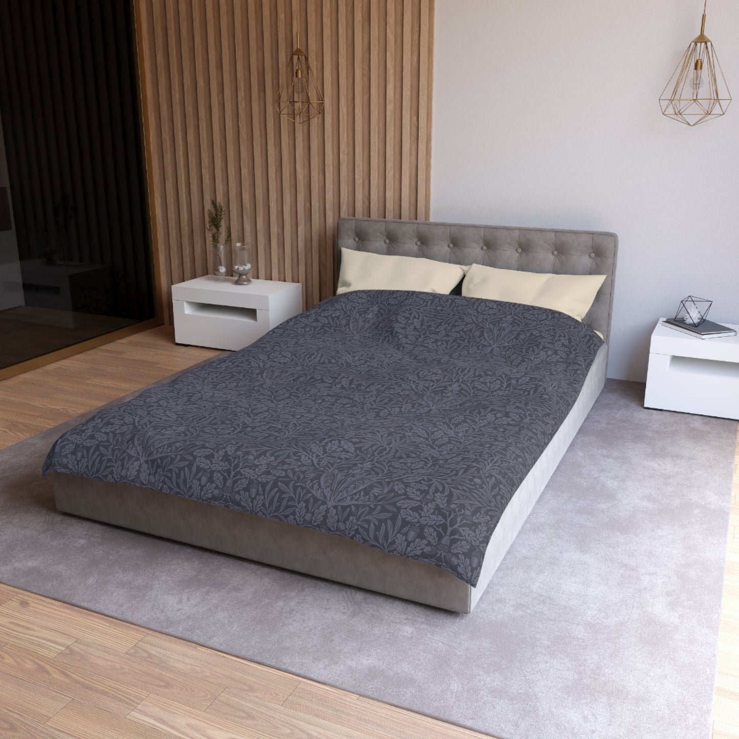 Bedroom with a bed featuring a gray comforter and beige pillows, flanked by two white nightstands.