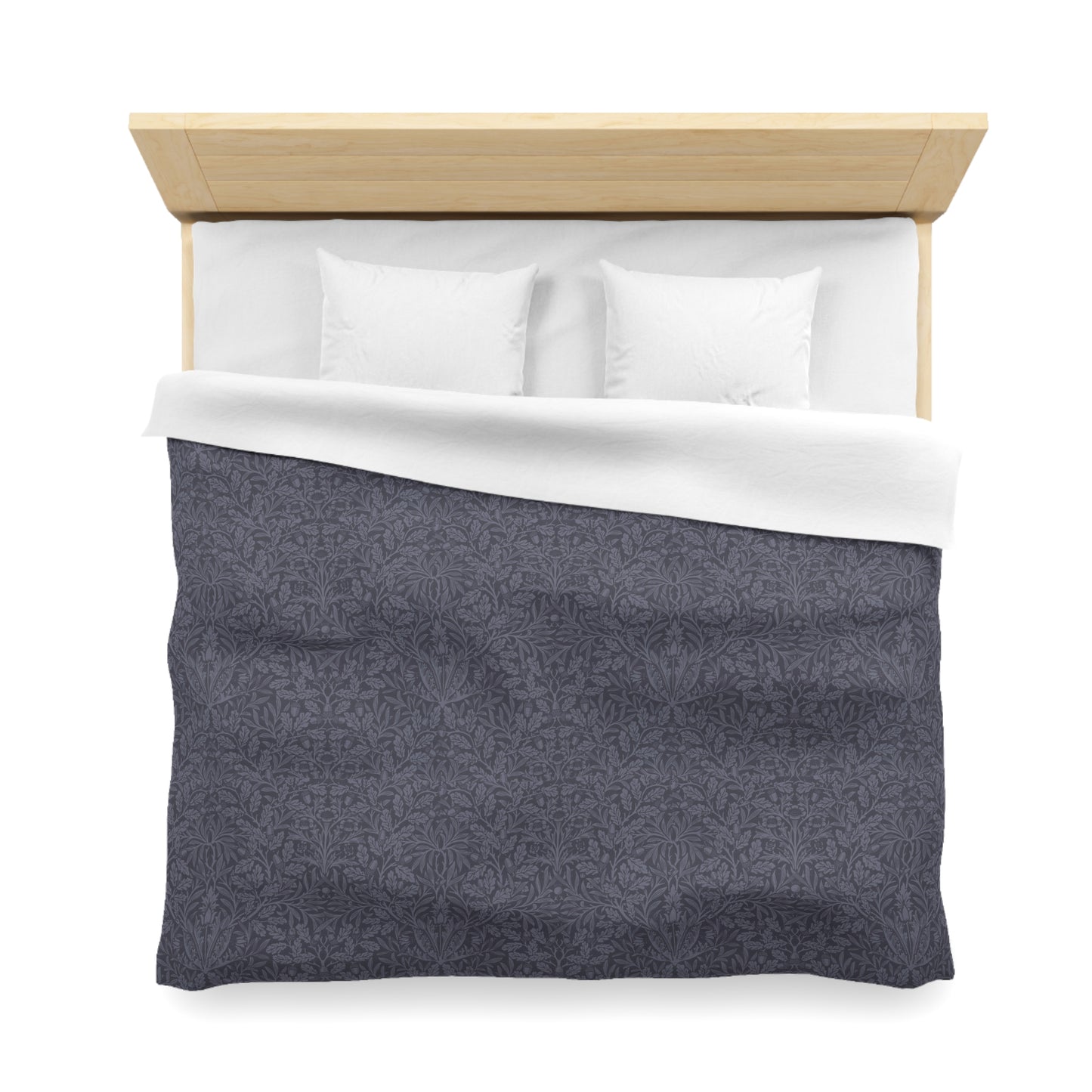 Bed with gray comforter and white pillows on a white background