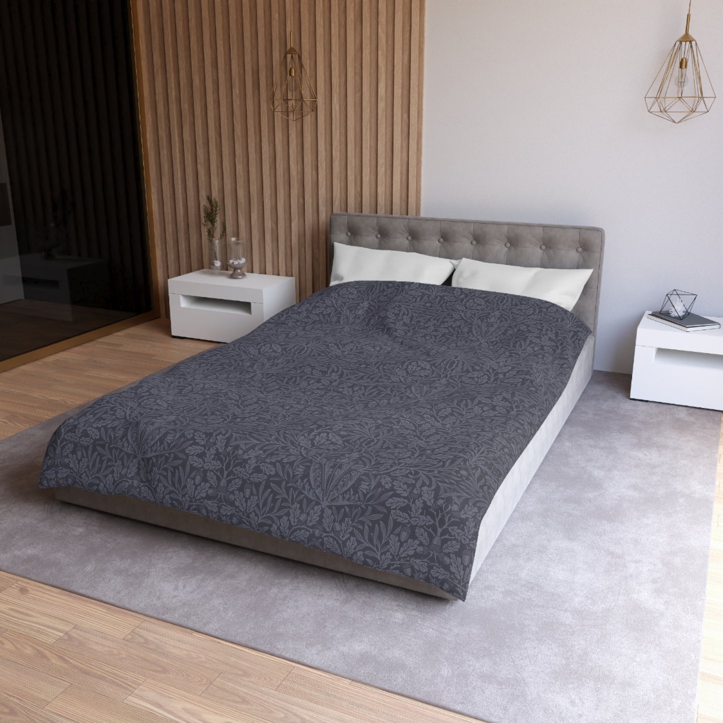 Bedroom with a bed featuring gray bedding and white pillows, nightstands on either side.