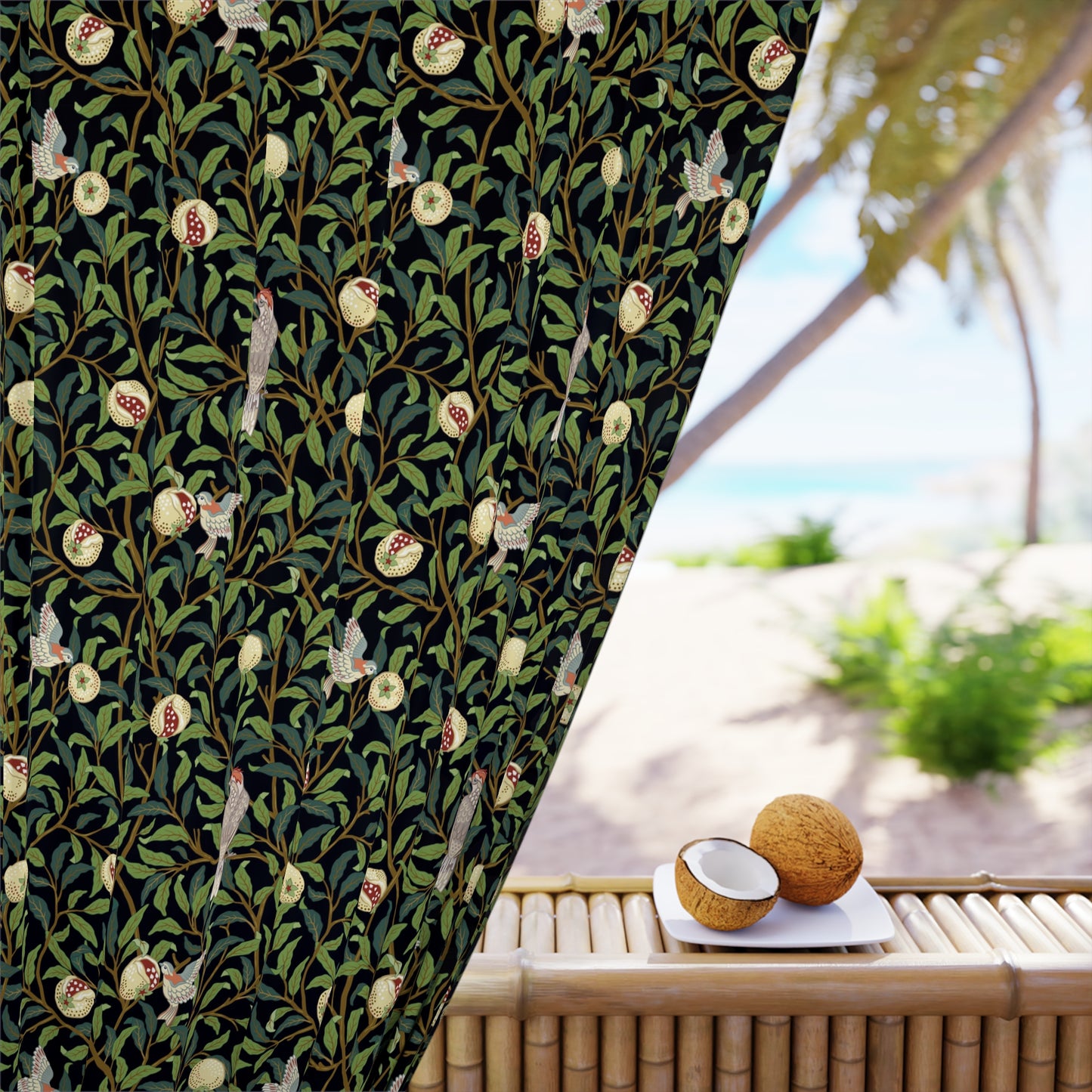 Decorative curtain with nature-themed pattern next to a table with coconuts and a beach view.