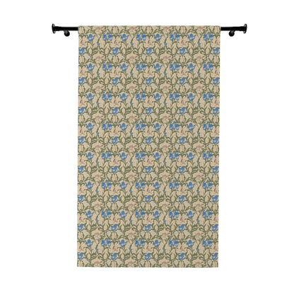Decorative curtain with blue floral pattern on a beige background