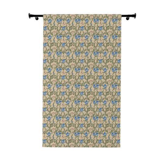 Decorative curtain with blue floral pattern on a beige background