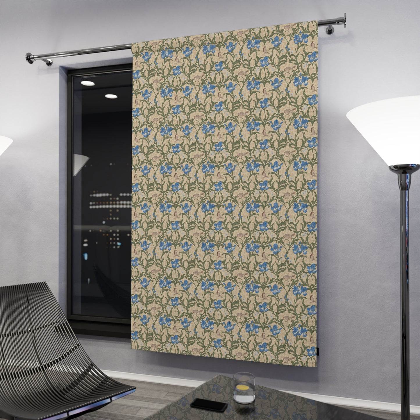 Decorative sliding barn door with floral pattern in a modern interior setting.