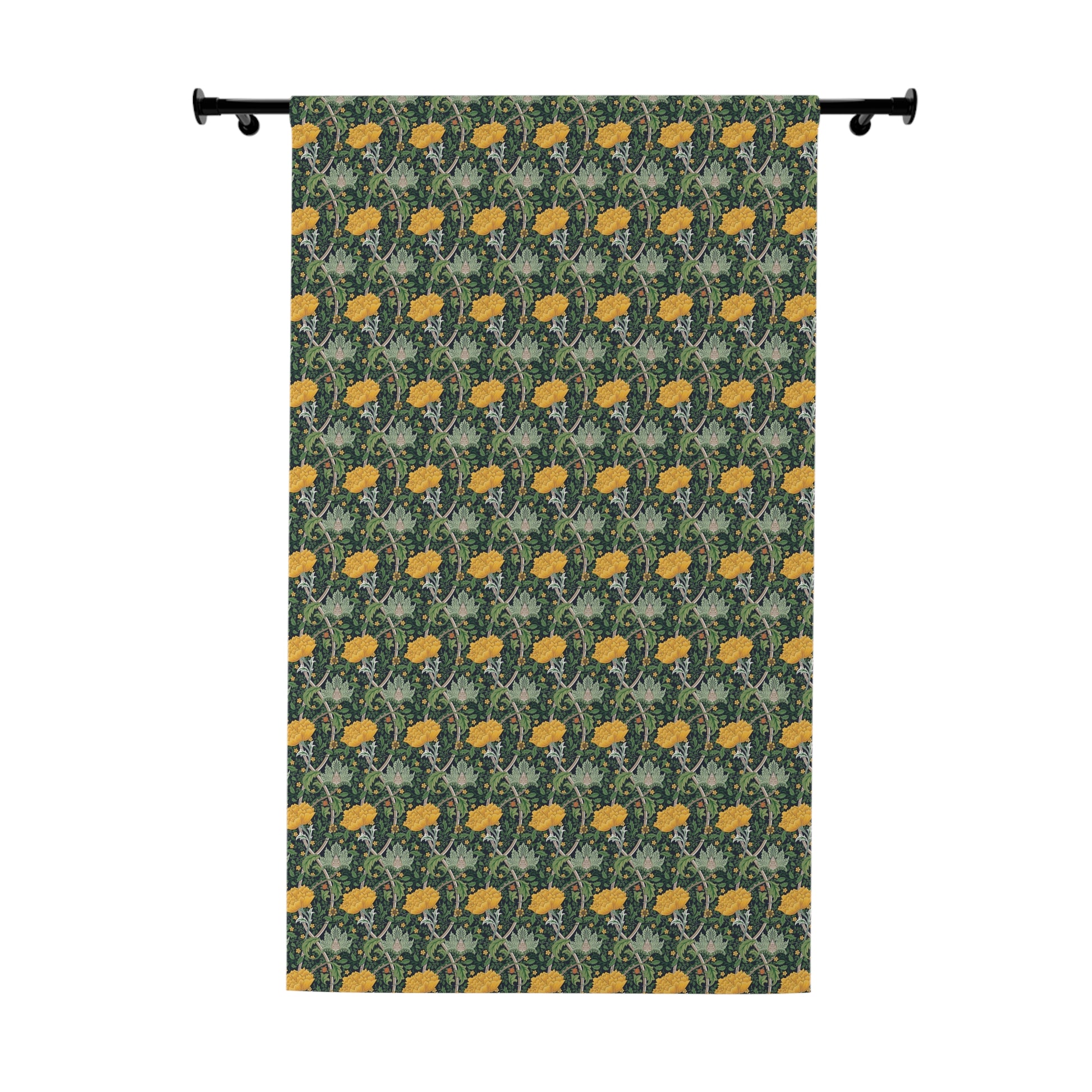 Decorative fabric with yellow floral pattern on a green background, hanging on a rod.