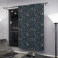 Patterned curtain hanging in a room with modern decor