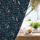 Decorative curtain with nature-themed pattern in a tropical setting