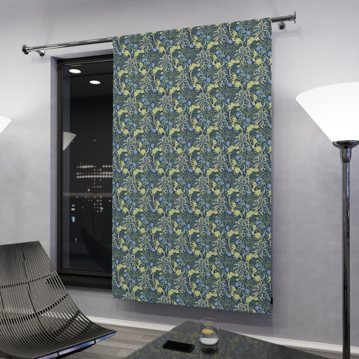 Decorative curtain with floral pattern in a modern room setting