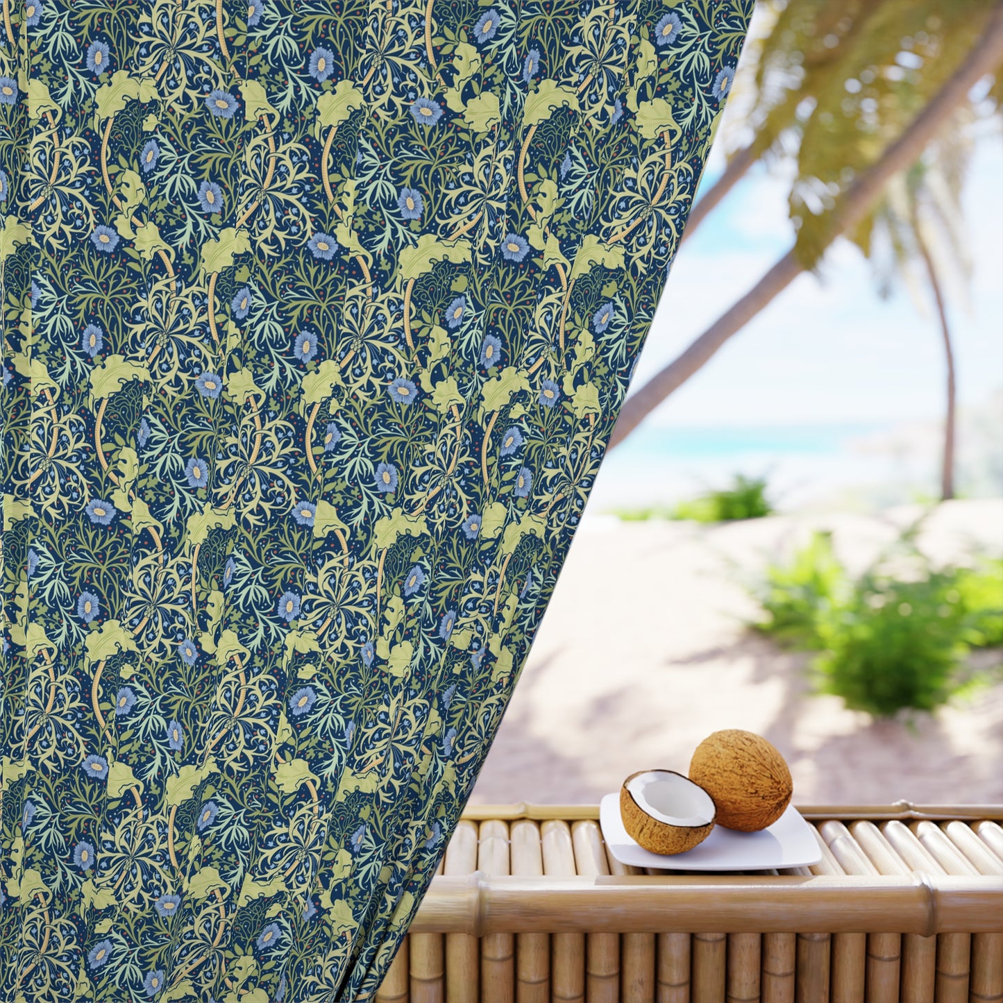 Floral patterned fabric with a beach scene featuring coconuts on a table.