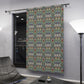 Decorative curtain with a colorful pattern in a modern room setting.