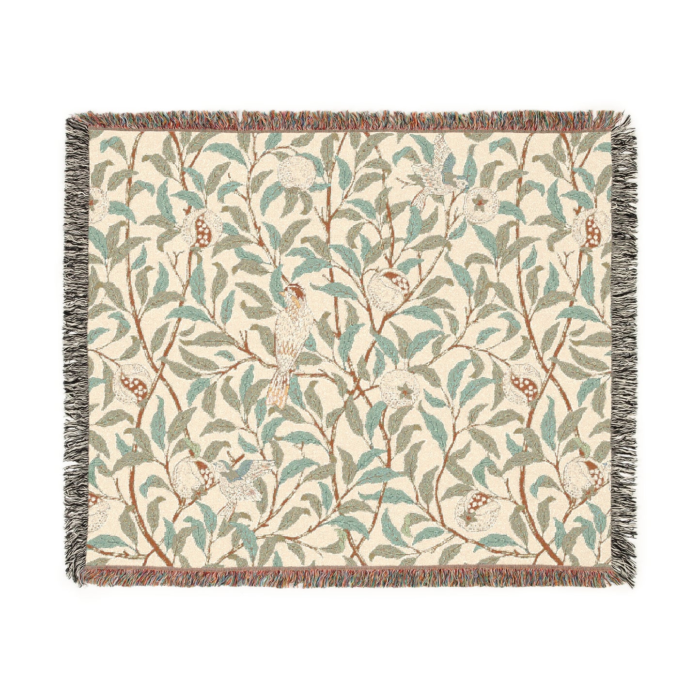 A woven cotton blanket with a geometric bird and pomegranate pattern in beige, green, and brown colors, with fringed edges.