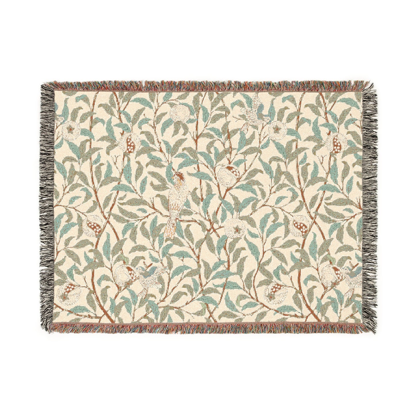 A woven cotton blanket with a geometric bird and pomegranate pattern in beige, green, and brown colors, with fringed edges.