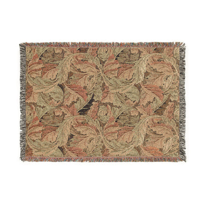 Woven blanket with leaf pattern on a white background