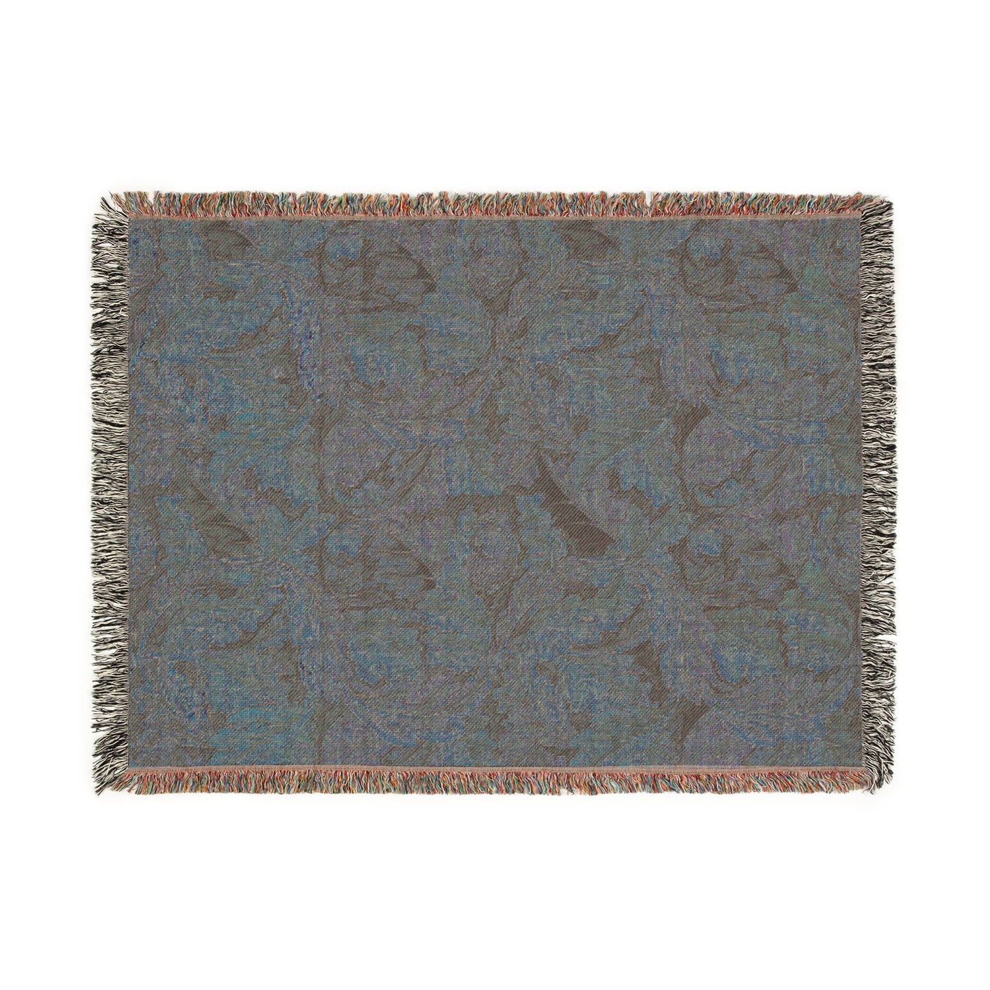 Floral patterned throw blanket with fringe on a white background