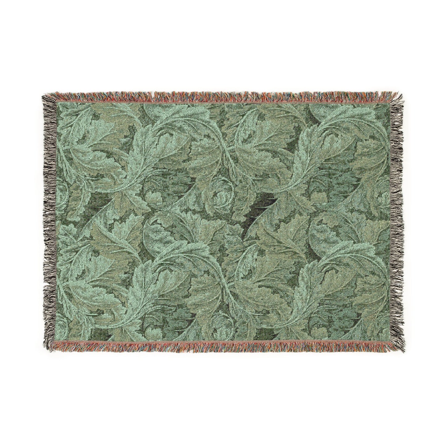 Green woven blanket with leaf pattern on a white background