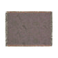 Textured blanket with floral pattern on a white background