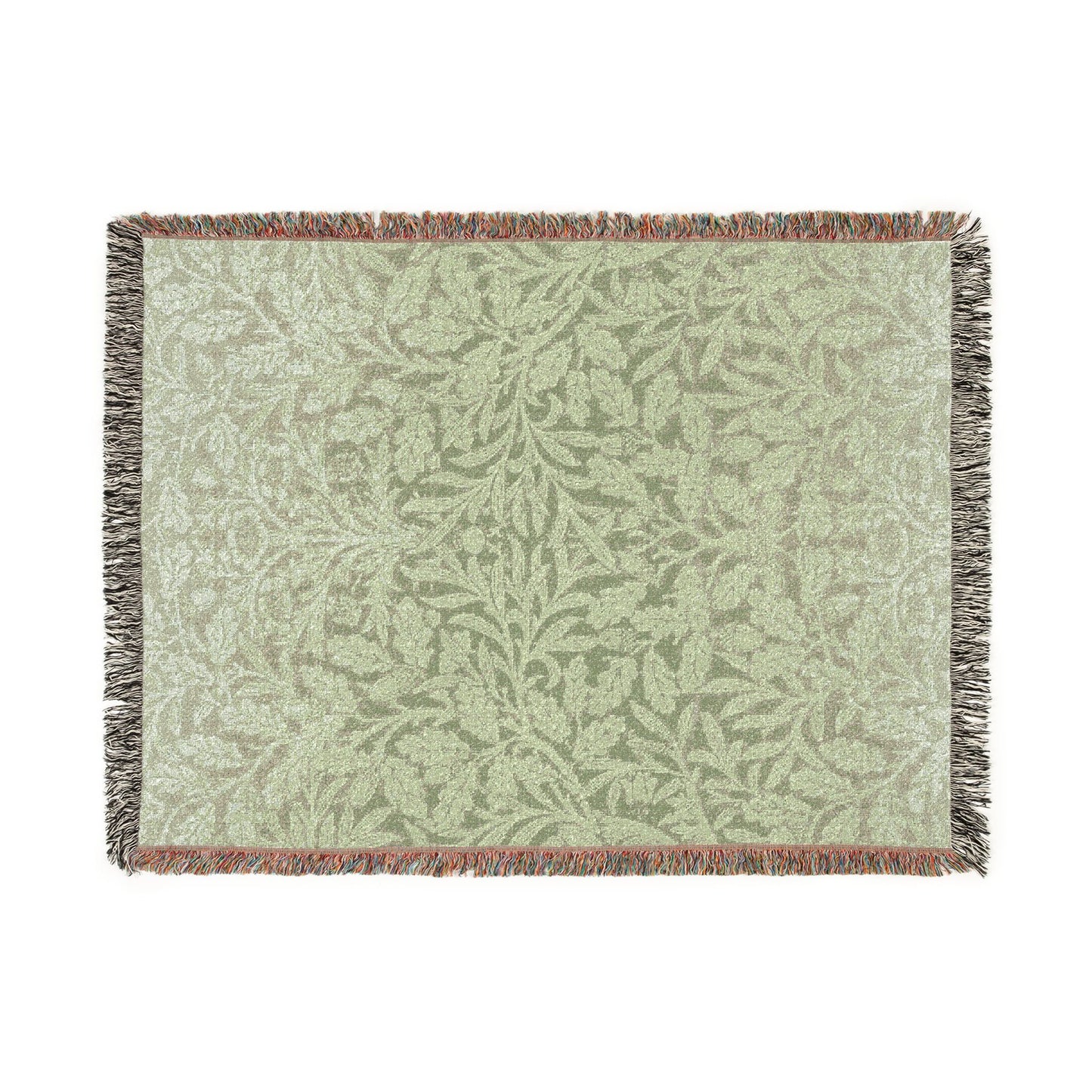 Woven blanket with a leaf pattern on a white background