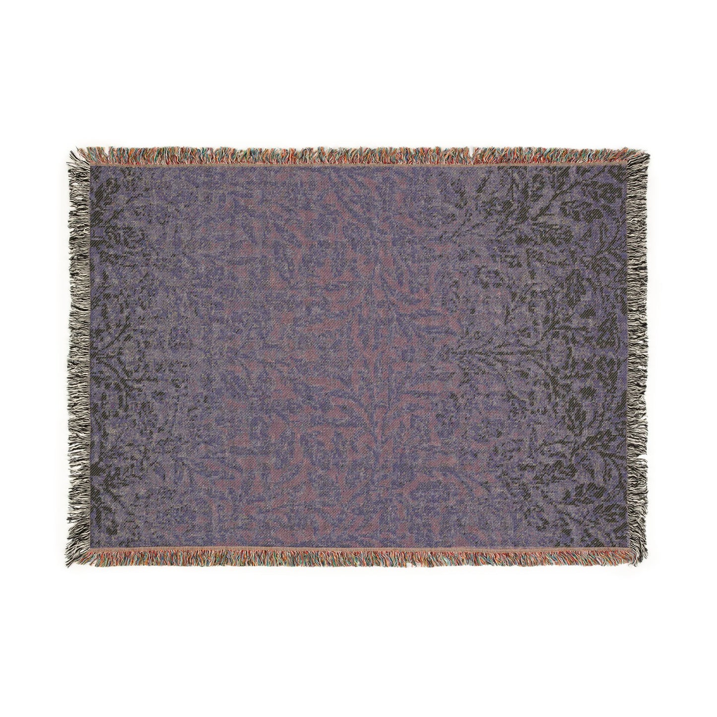 Decorative throw blanket with a floral pattern on a white background
