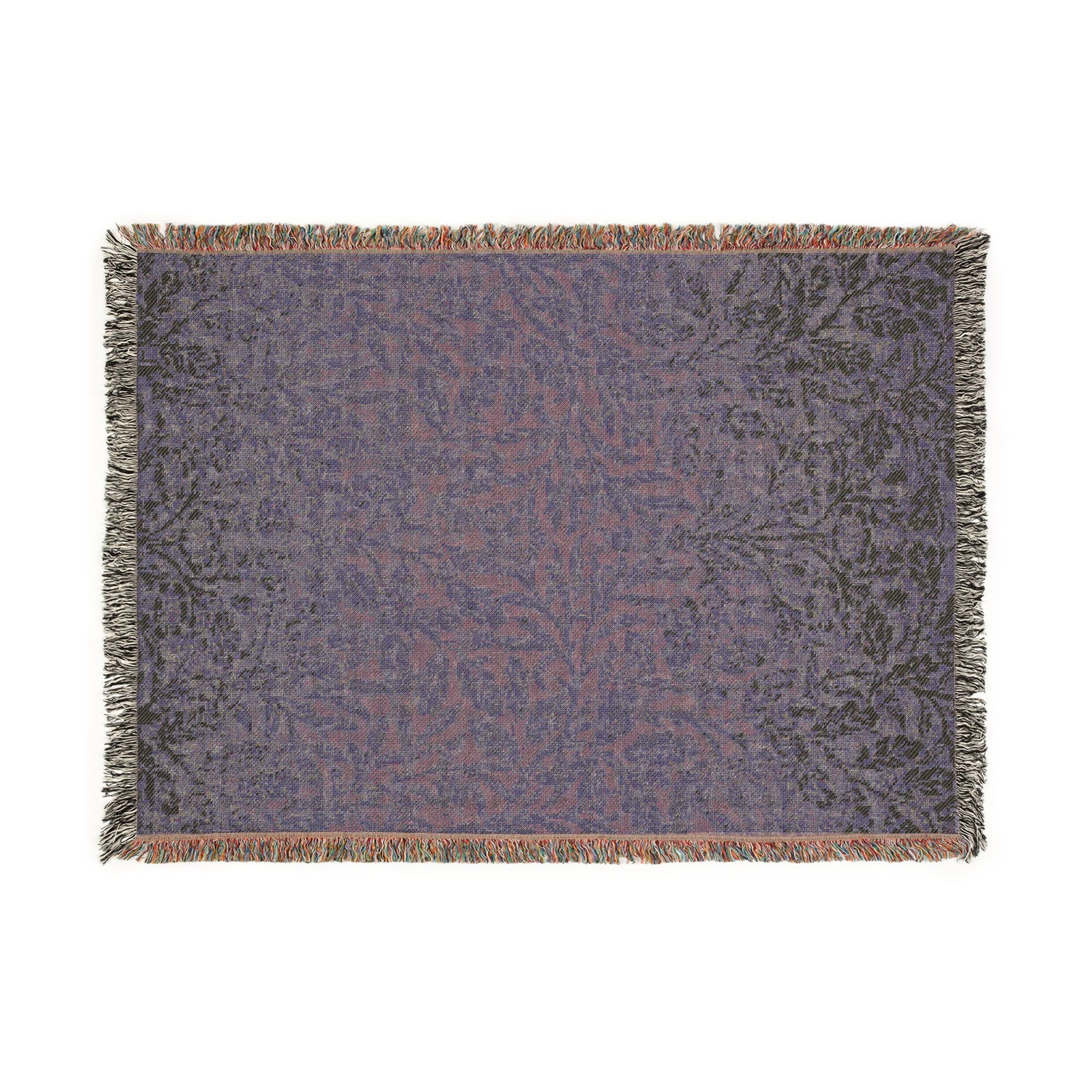 Decorative throw blanket with a floral pattern on a white background