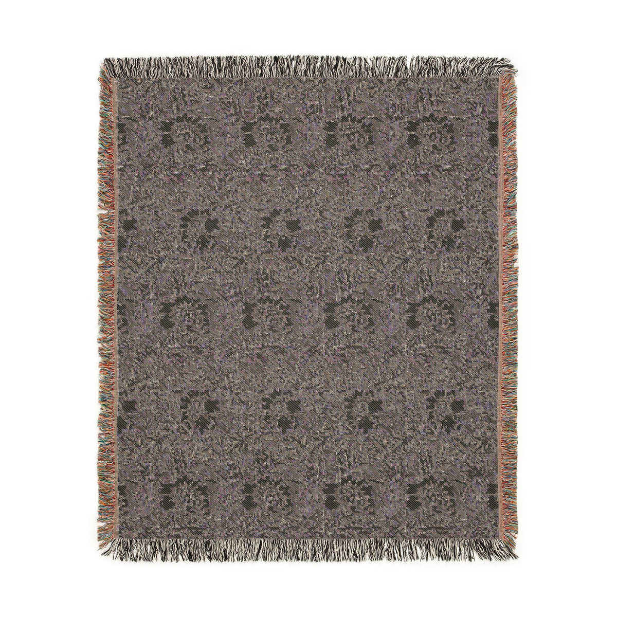 A rectangular woven throw blanket with a textured, heathered pattern in shades of gray, purple, and black, featuring a subtle repeating medallion design and fringed edges.