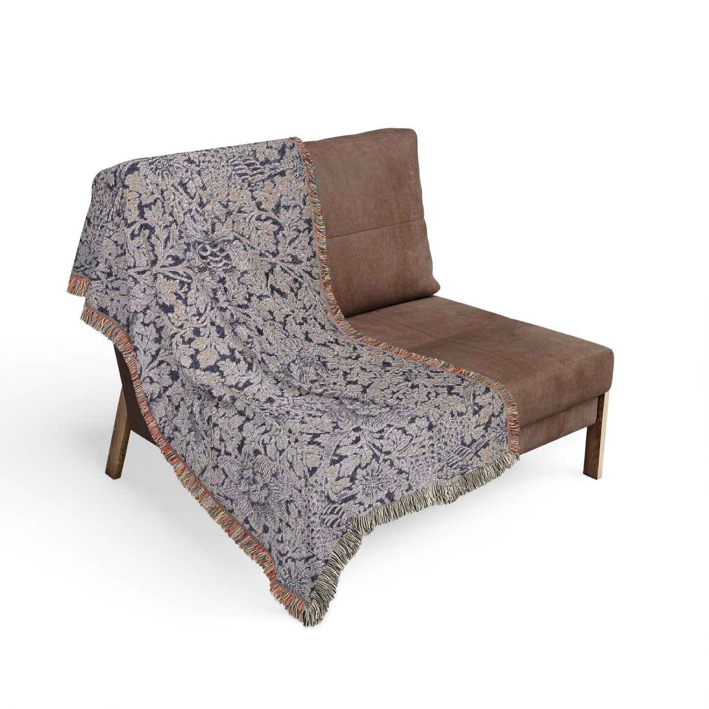 Brown chair with a patterned gray blanket draped over it on a white background