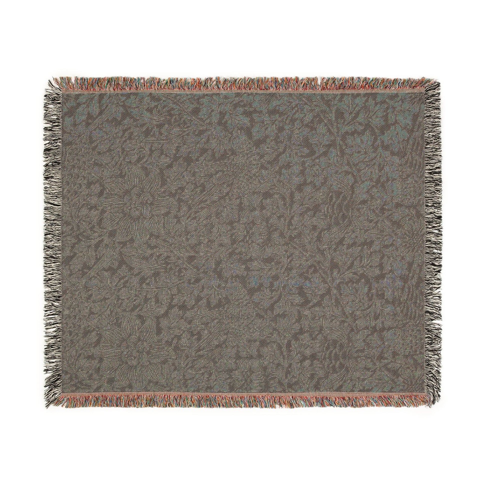 Gray patterned throw blanket with fringe on a white background