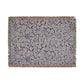 Floral patterned throw blanket with fringe on a white background