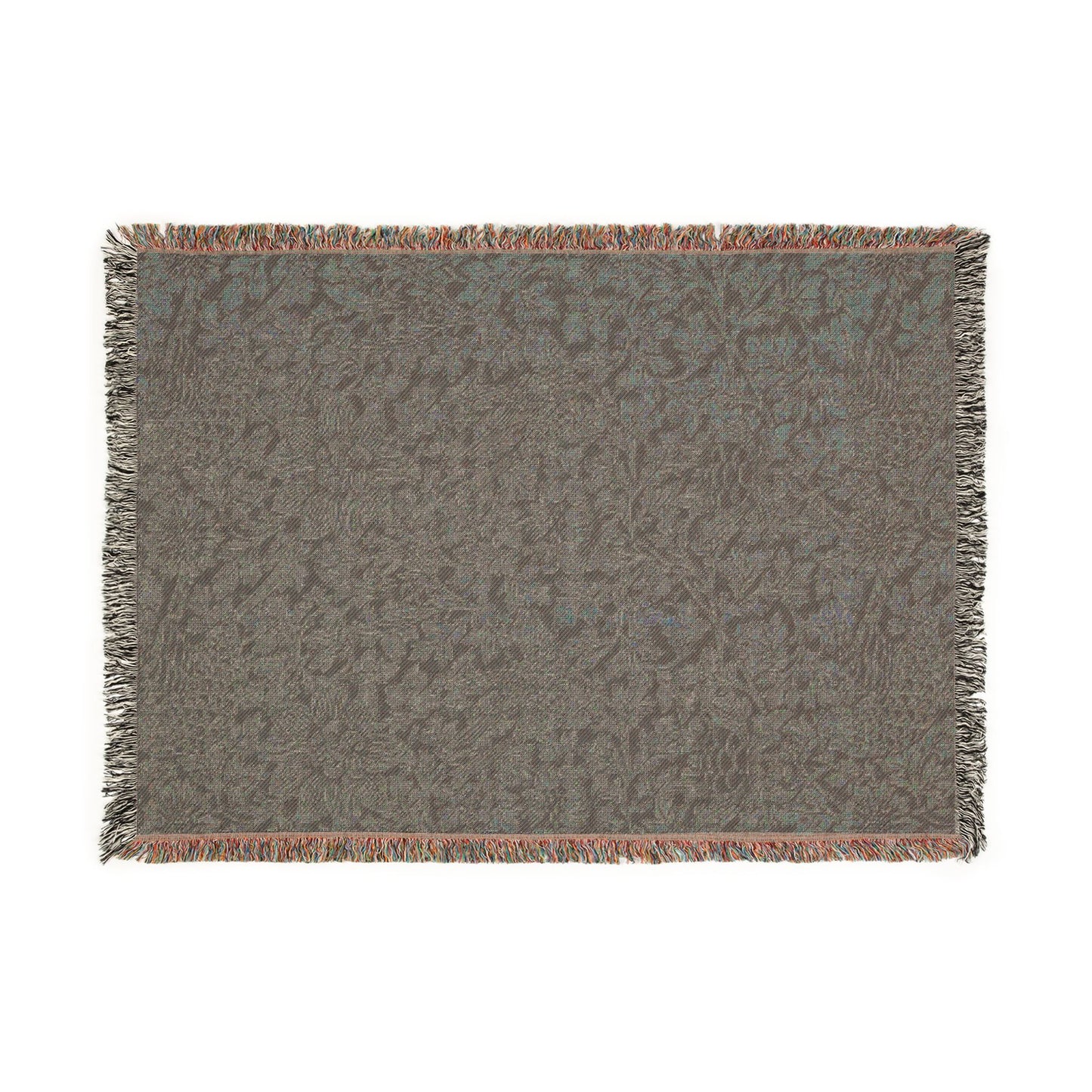 Textured gray rug with fringe on a white background