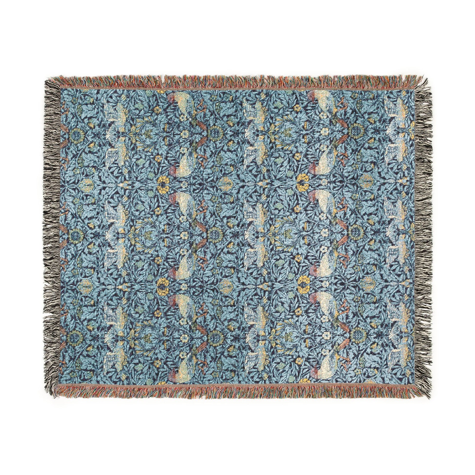 Decorative throw blanket with floral pattern on a white background