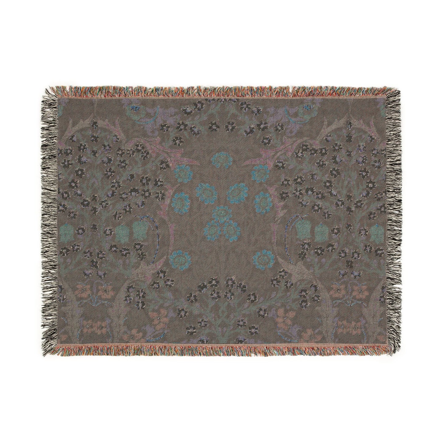 Decorative throw blanket with a floral pattern on a plain background