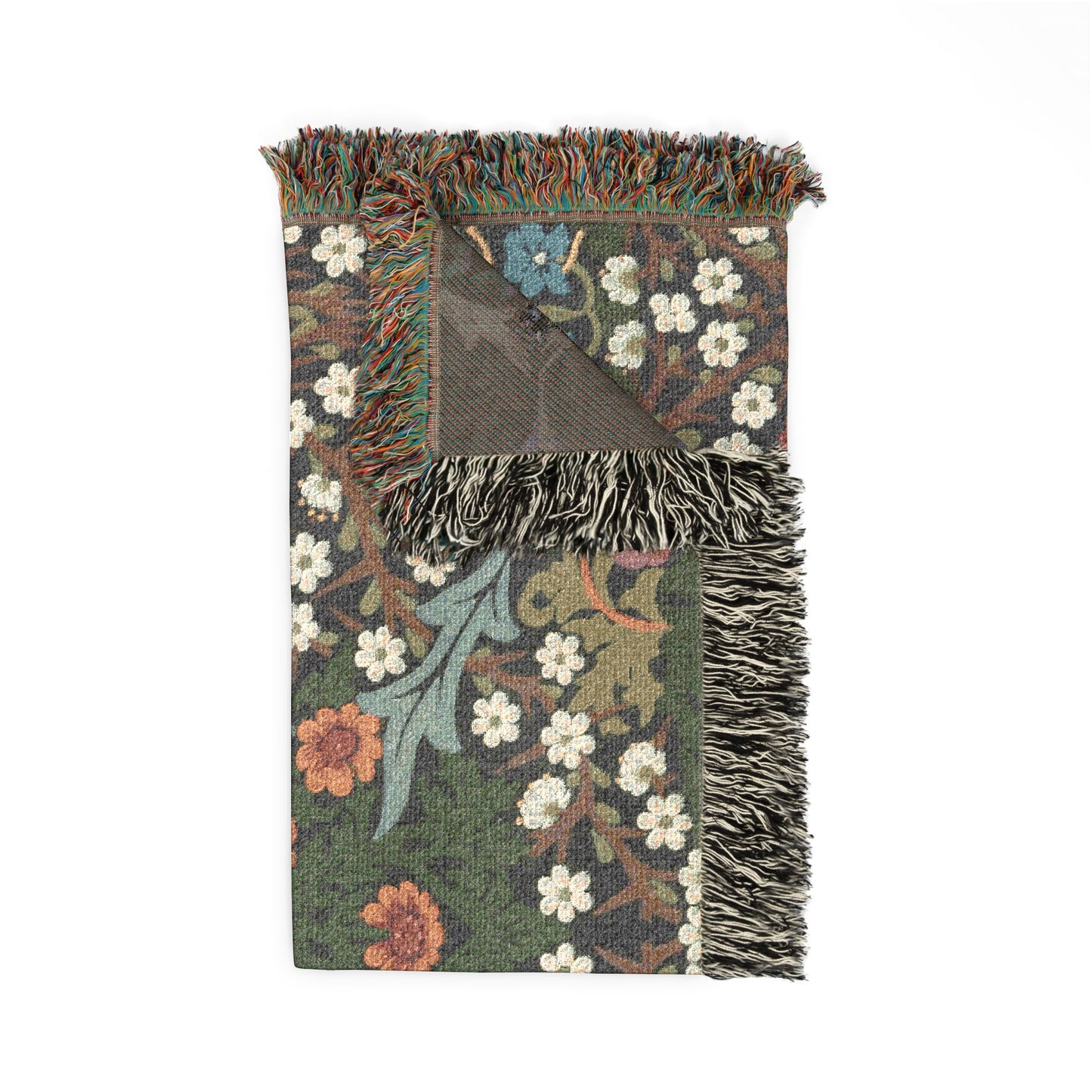 Floral patterned blanket with fringes on a white background