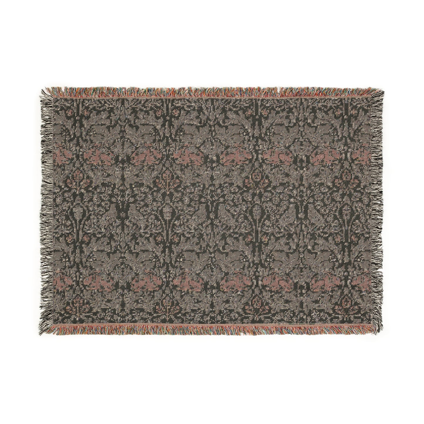 A woven cotton blanket with a geometric William Morris & Co pattern in gray, blue, and beige colours, featuring fringed edges.