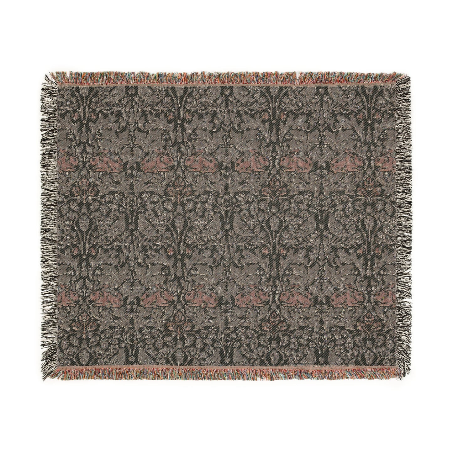 A woven cotton blanket with a geometric William Morris & Co pattern in gray, blue, and beige colours, featuring fringed edges.