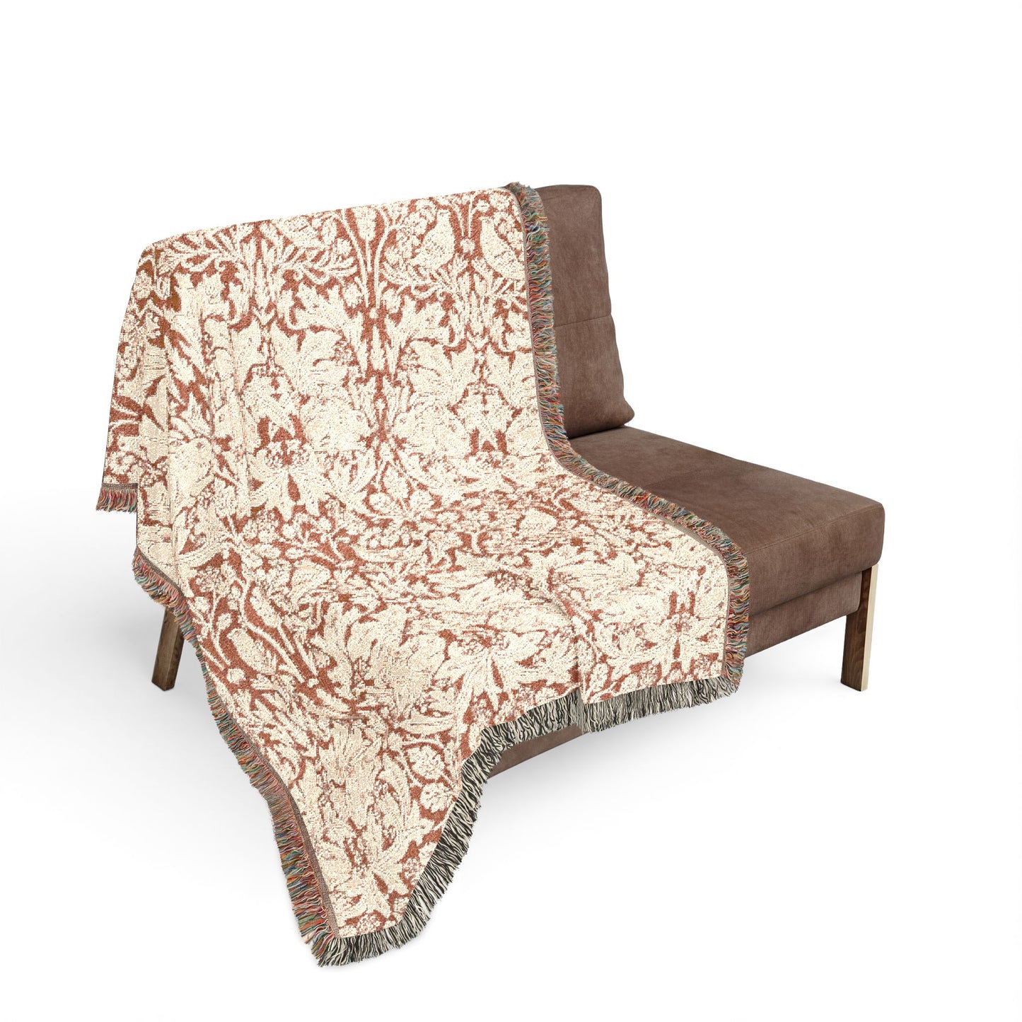 Decorative blanket with 'Thankful & Blessed' text and autumnal design draped over a chair.