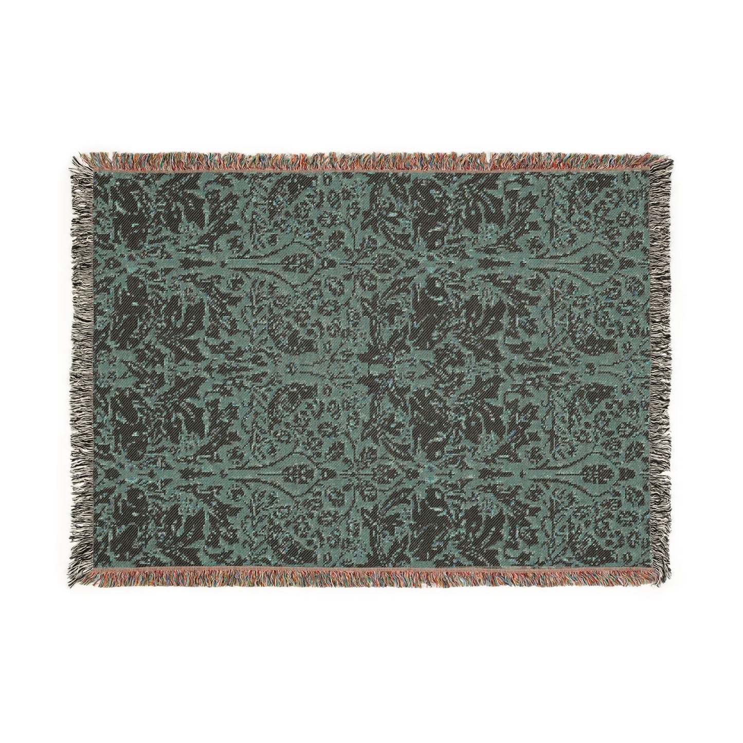 Decorative throw blanket with a floral pattern on a plain background