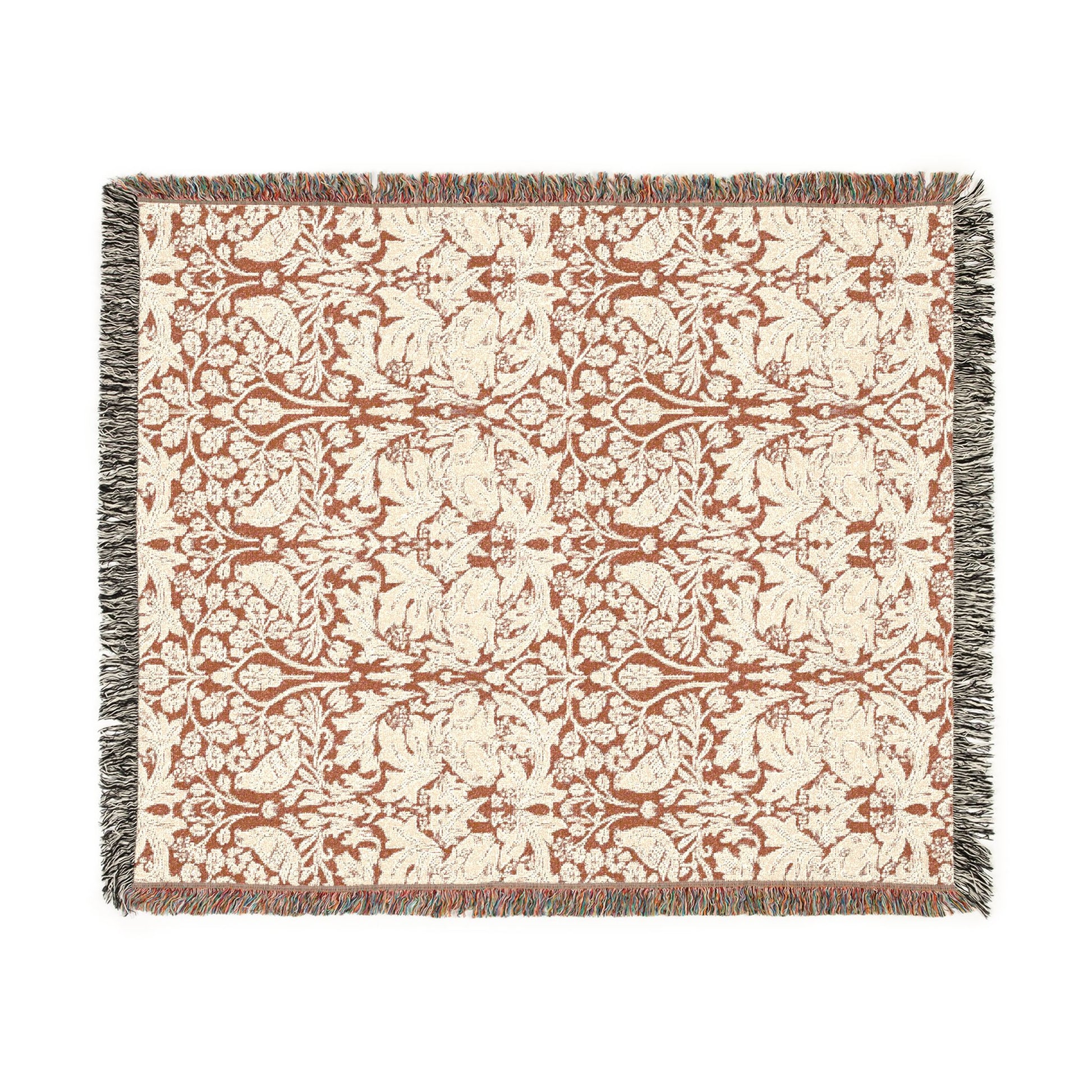 Patterned throw blanket with decorative design on a white background