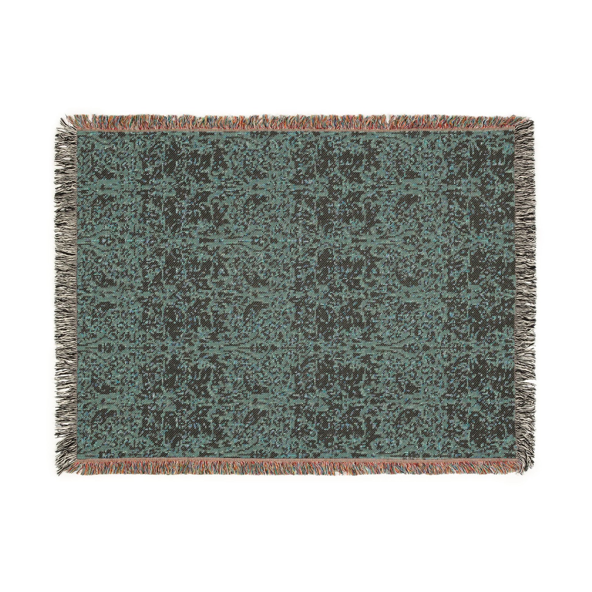 Textured green and brown patterned throw blanket on a white background