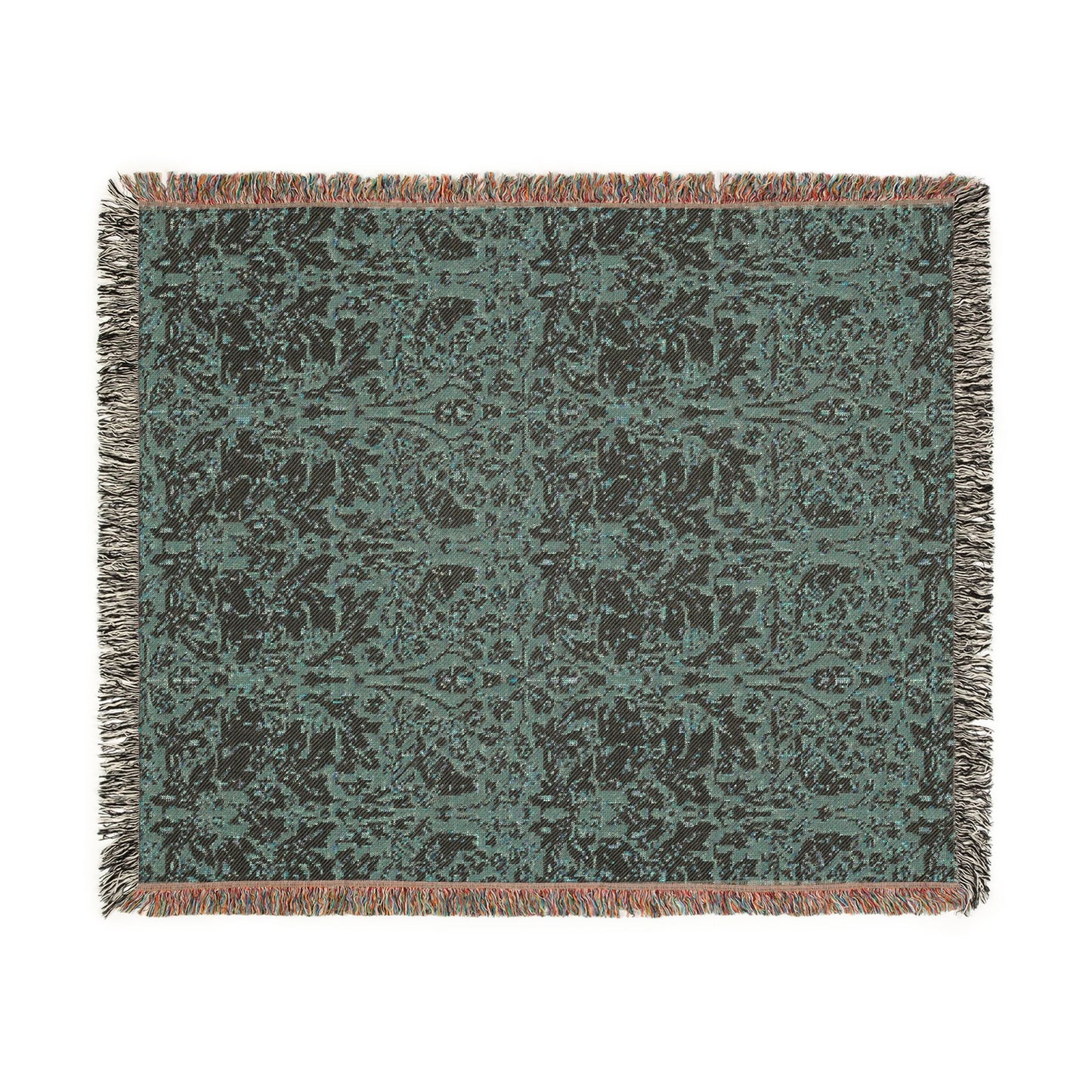 Patterned throw blanket with fringes on a white background
