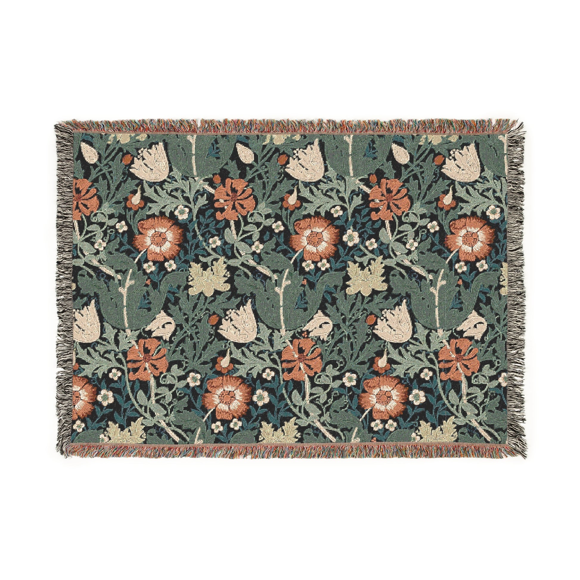 A woven cotton blanket with a William Morris & Co floral pattern in green, brown, and beige colours, featuring colourful fringed edges.