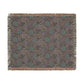 Floral patterned throw blanket on a white background