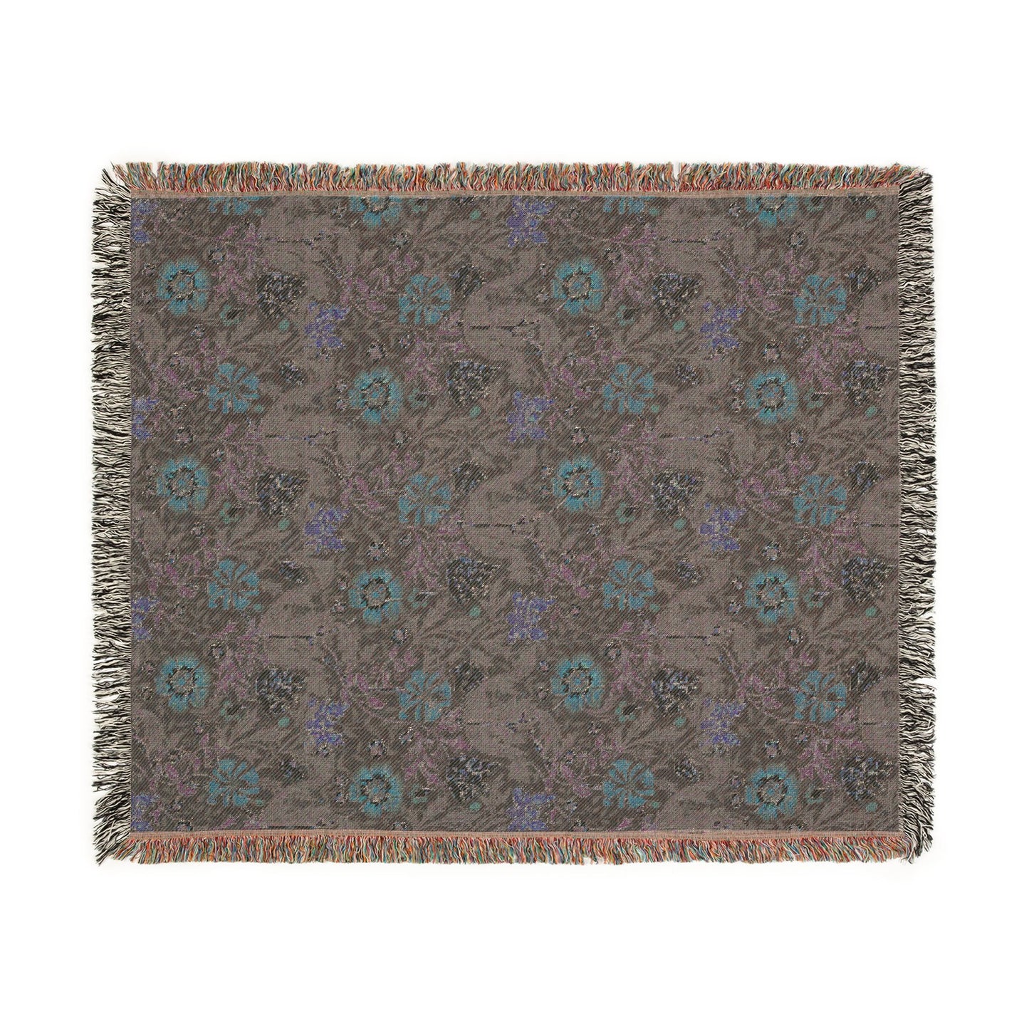 Floral patterned throw blanket on a white background