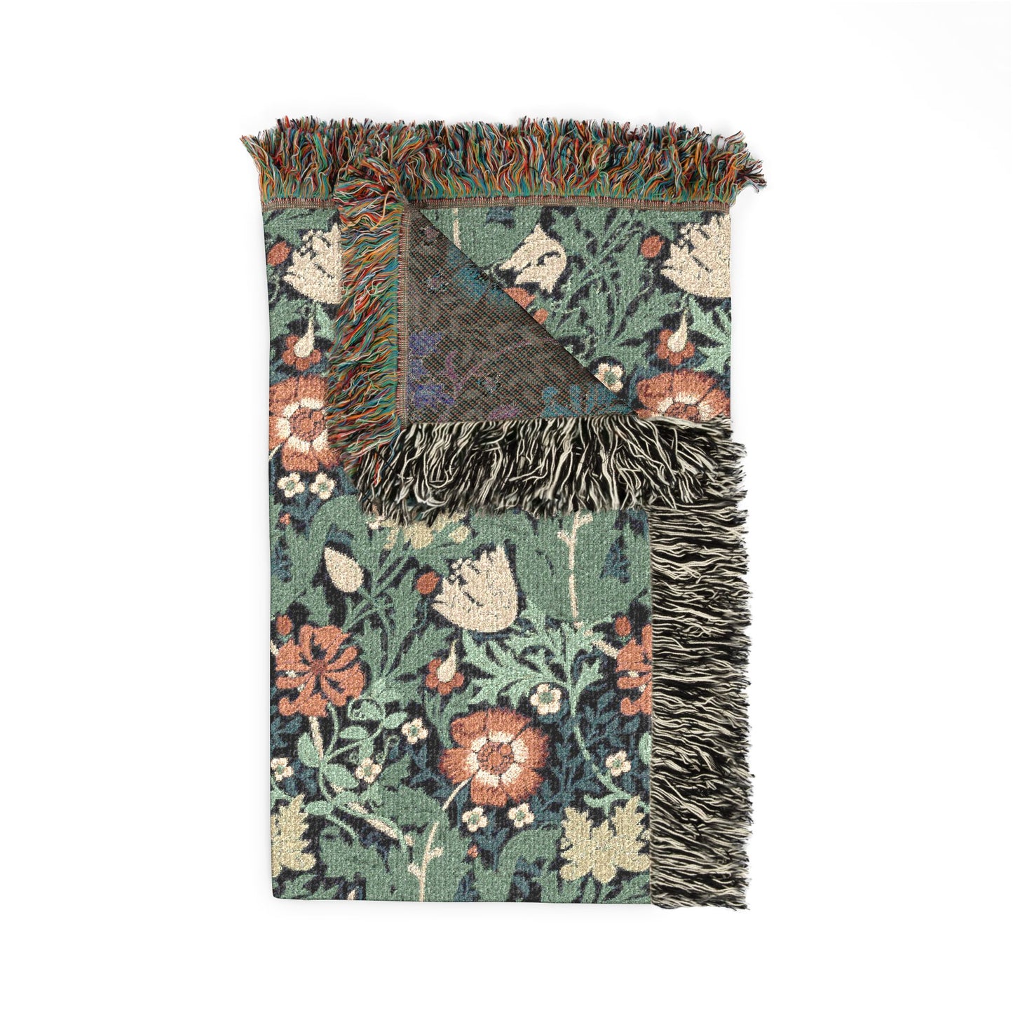 Floral patterned throw blanket with fringes on a white background