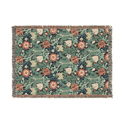 Floral patterned rug with green background on a white background