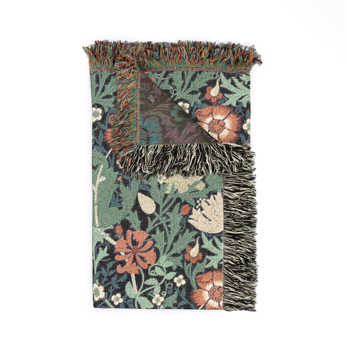 Floral patterned throw blanket with fringes on a white background