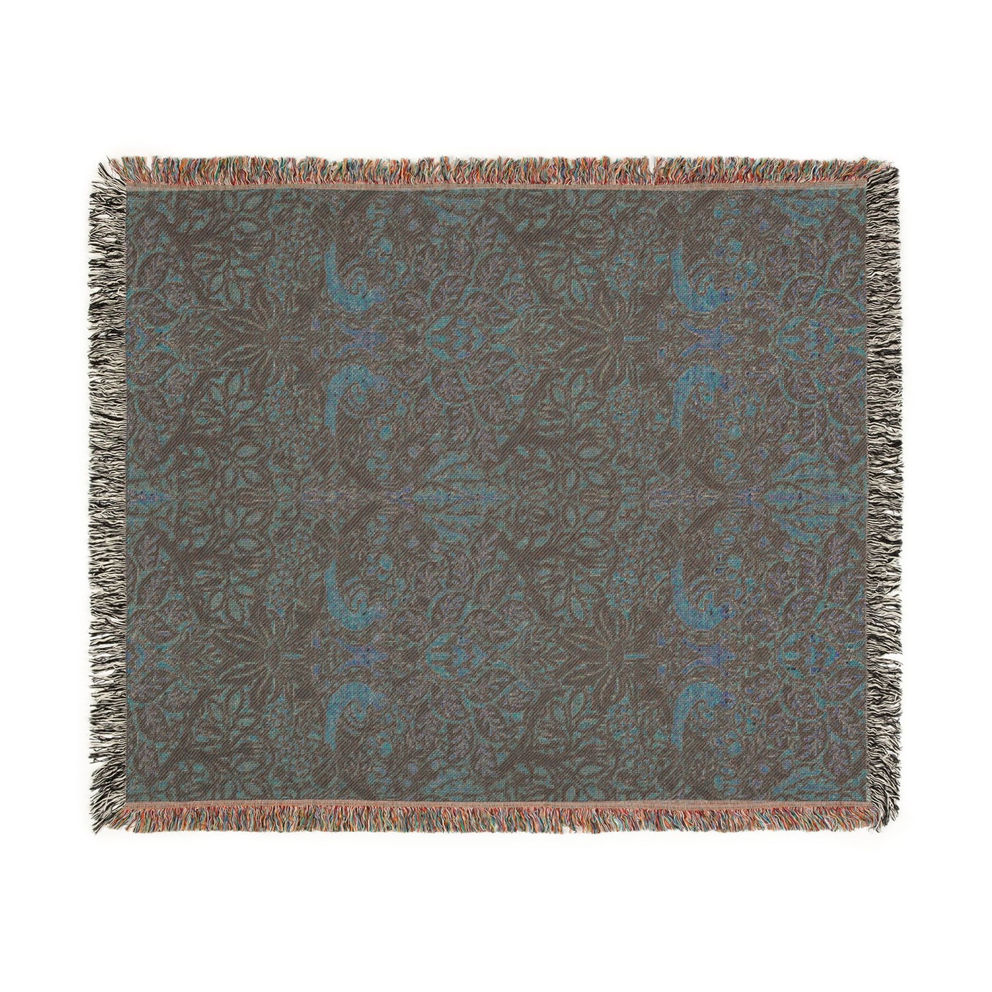 Decorative throw blanket with a floral pattern on a white background